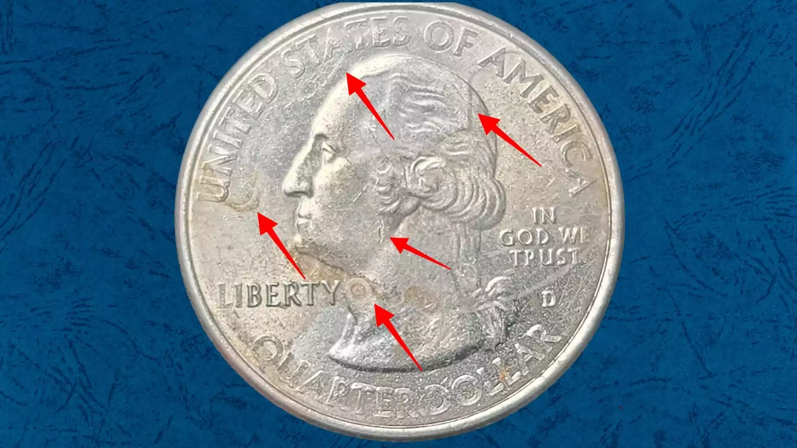 2016 quarter die clash error showing faint ghost impressions of the reverse design transferred into the obverse field